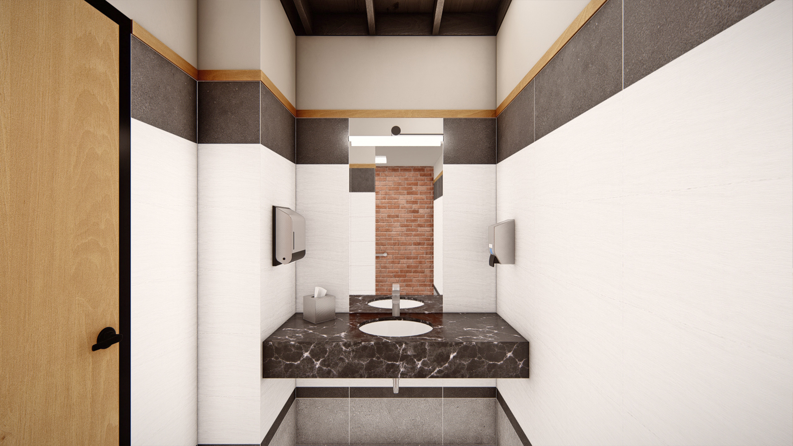 Interior view of a modern restroom at Coldwell Banker in The Shops, Coeur d'Alene, Idaho, featuring a dark marble countertop with an undermount sink, wall-mounted soap and towel dispensers, and a brick accent wall reflected in the mirror.